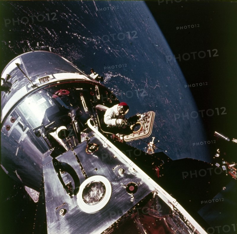 Module pilot David Scott emerging from Apollo 9 spacecraft, 6 March 1969. Creator: Russell Schweickart.