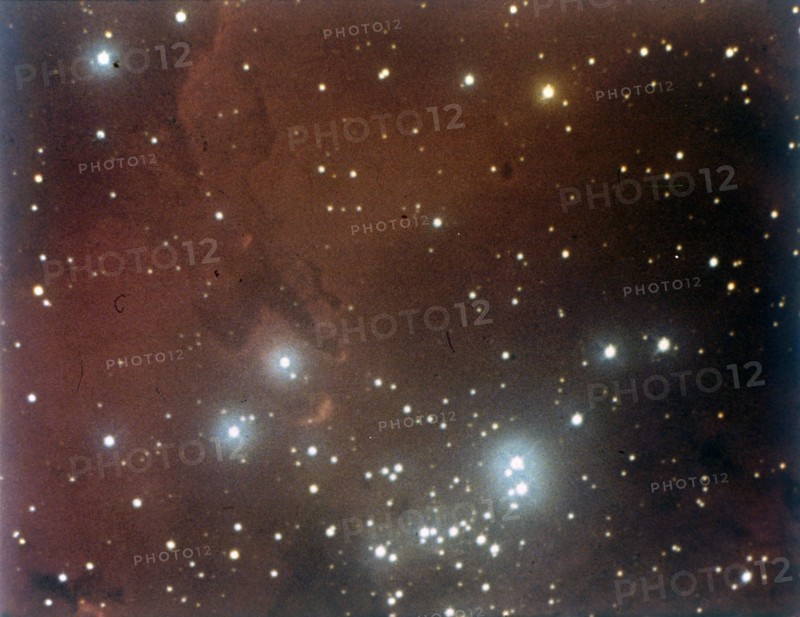 Nebulosity and star cluster in Serpens. Creator: NASA.