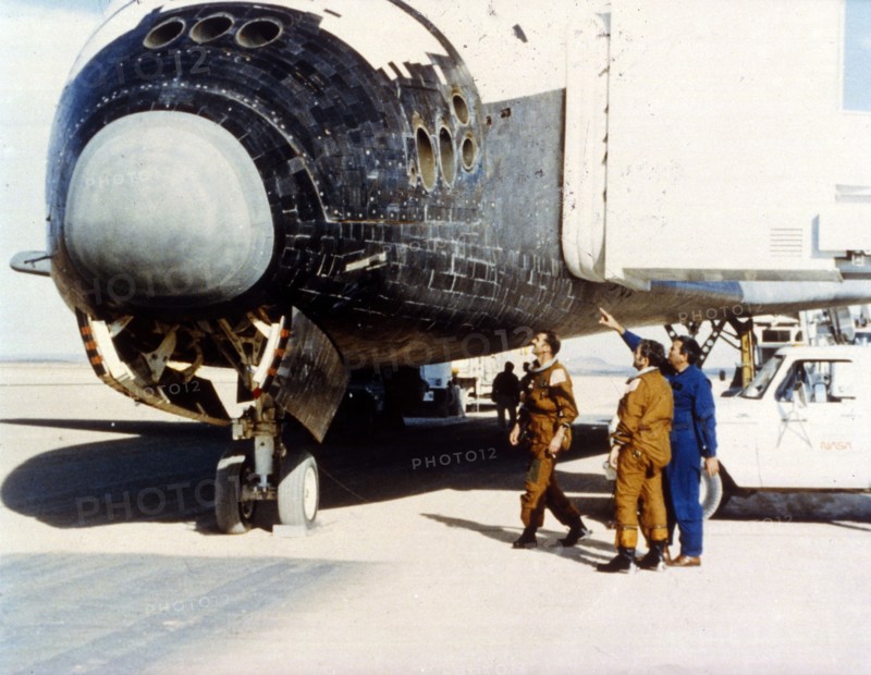 Inspecting heat tiles, second Space Shuttle flight, November 1981. Creator: NASA.