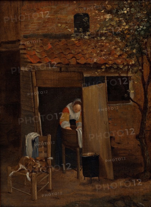 Girl washing clothes.