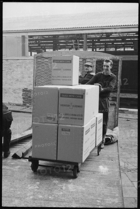 Workers moving glassware at the Wear Flint Glass Works, Alfred Street, Millfield, Sunderland, 1961