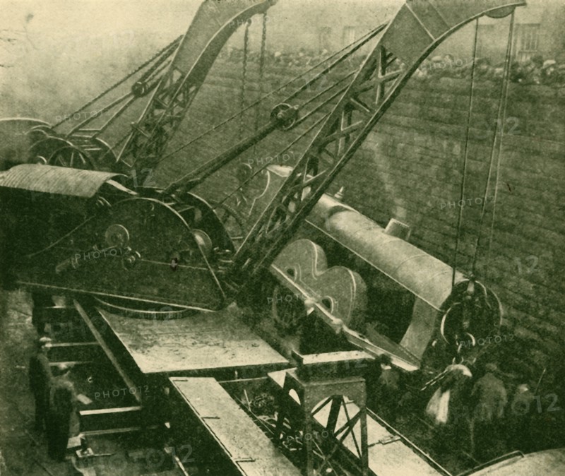 Cranes At Work After An Accident', 1930.