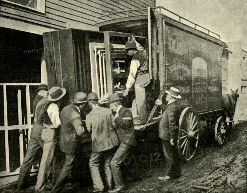 Loading The Camera On A Van For Removal', 1901.