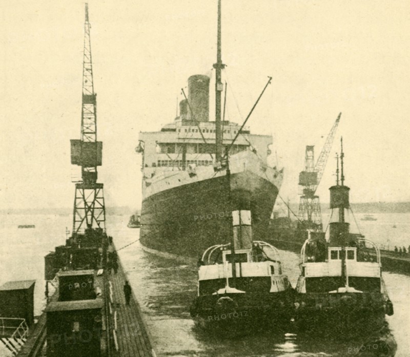 The "Majestic" Entering Dry Dock Hauled by Tugs', c1930.