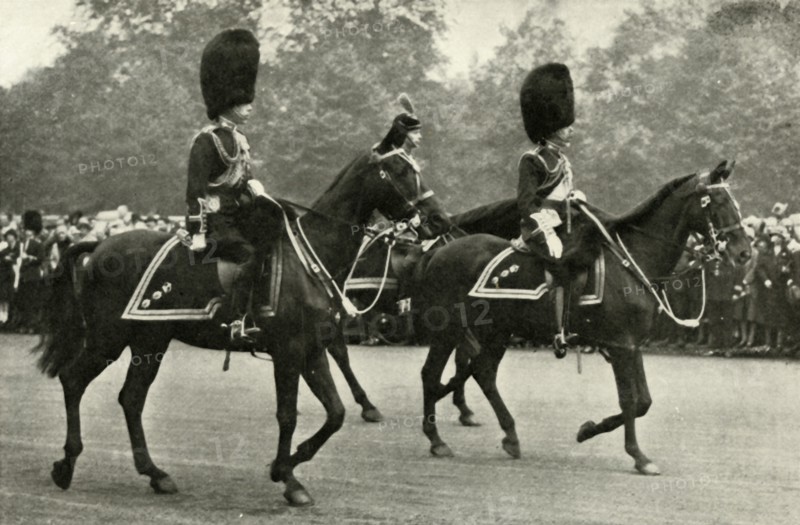 King George Riding With the Late King George V and the Prince of Wales, 1928.', 1937.