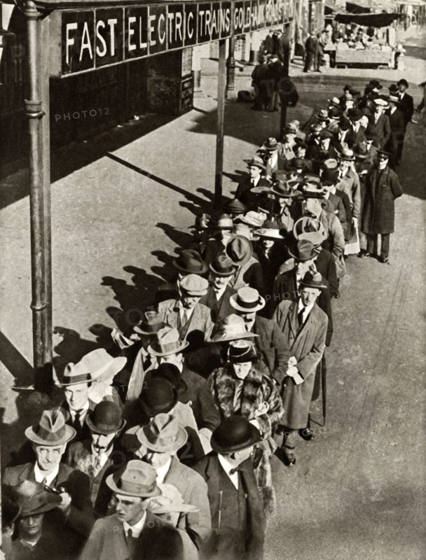 Passengers waiting at Goldhawk Road Station in London during the railway strike,1919