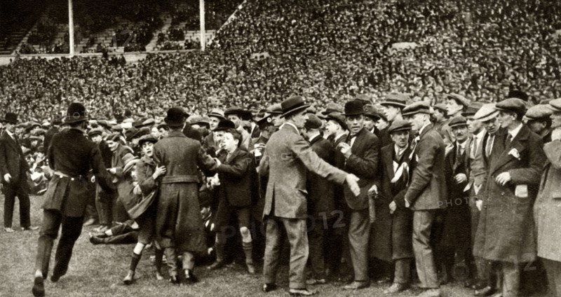 The first FA Cup Final is held at the new Wembley Stadium in London, 28 April 1923