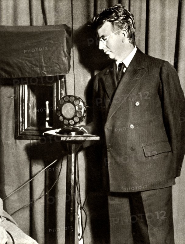 John Logie Baird watching the first play to be televised, 14 July 1930
