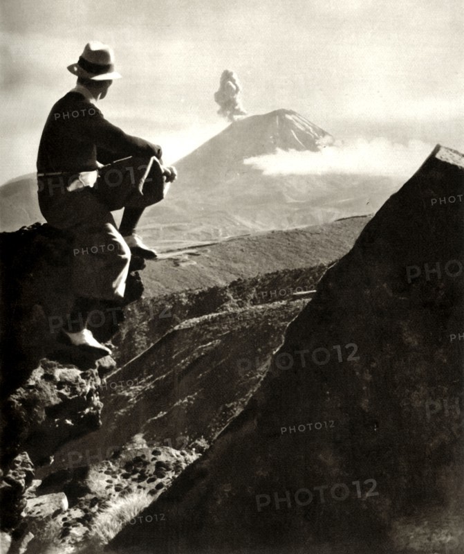 'The Rotorua district in the North Island of New Zealand - The climber is resting on a rocky promine Creator: Unknown,