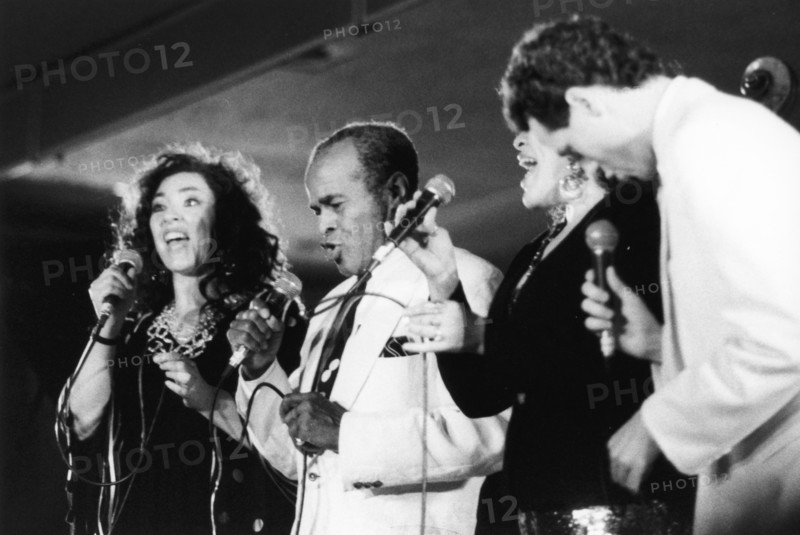 Jon Hendricks and three unidentified singers, c1998. Creator: Brian Foskett.
