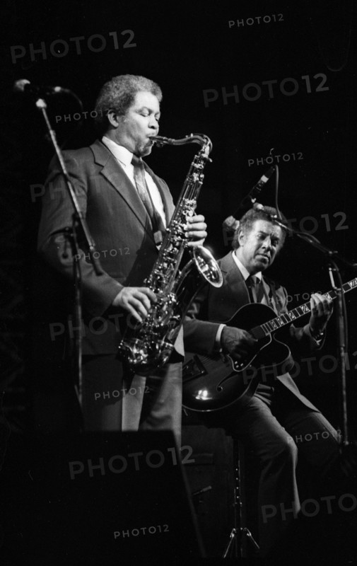 Frank Foster and Kenny Burrell, Dominion Theatre, London, Nov 1985. Creator: Brian O'Connor.