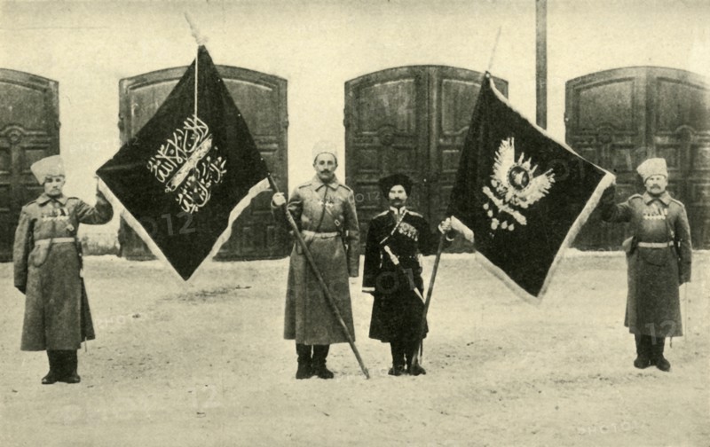 Russian soldiers with captured Turkish flags, First World War, 1915-1916, (c1920). Creator: Unknown.