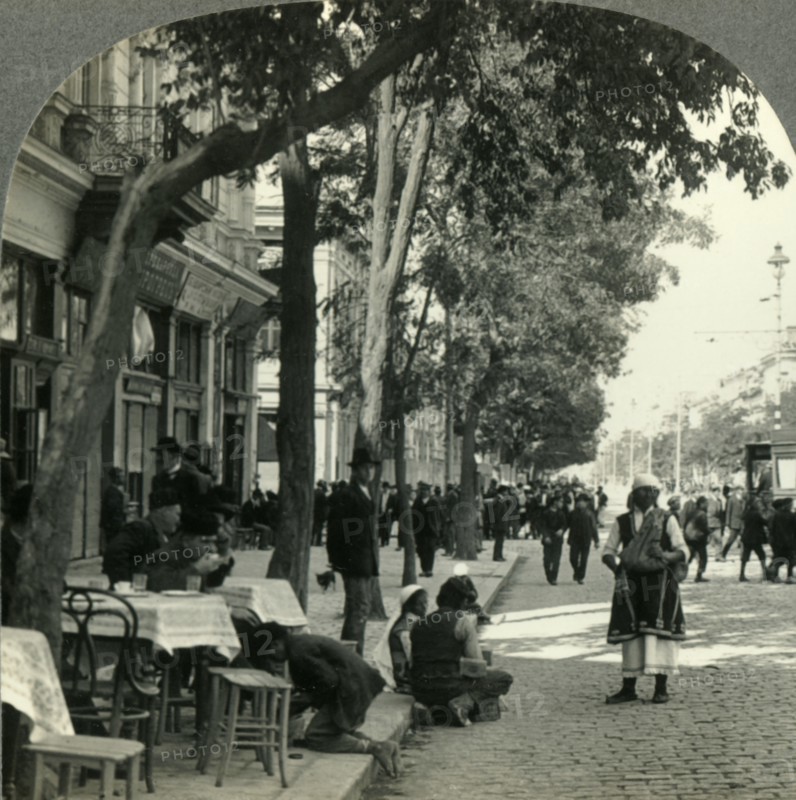 'Street Scene Showing Peasant Woman and Sidewalk Coffee-House, Sofia, Bulgaria', c1930s. Creator: Unknown.