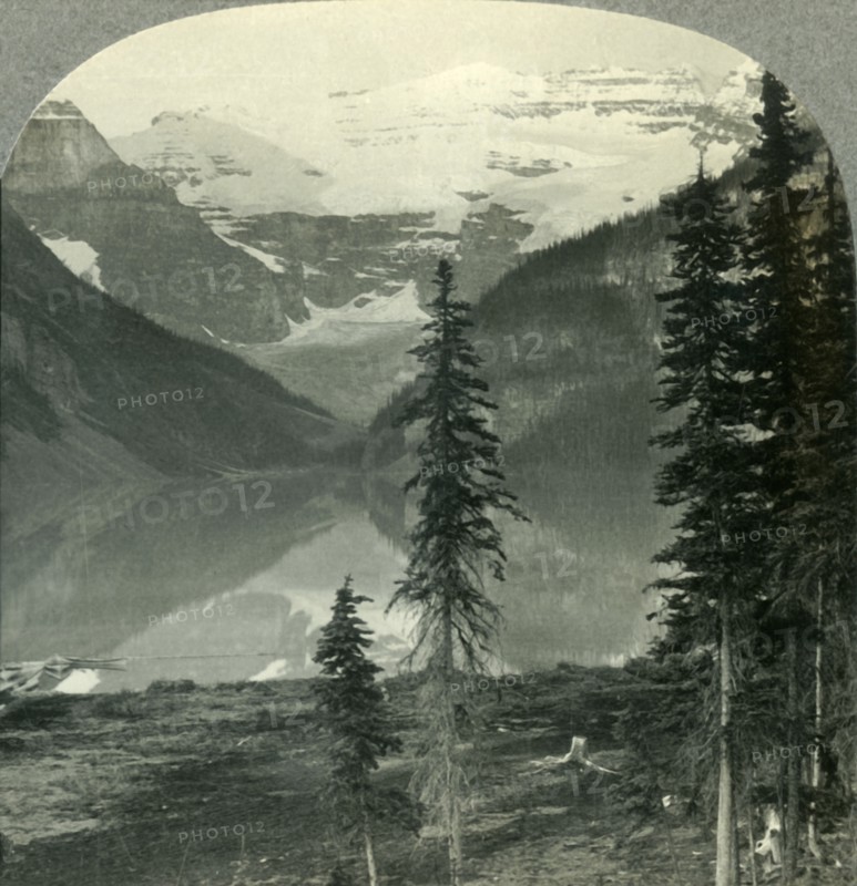 'Lake Louise, the "Queen of Lakes", and Mount Victoria. Alberta, Canada.', c1930s. Creator: Unknown.