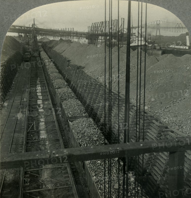 'Unloading Iron ore at Port of Cleveland, Ohio, the Heaviest Handler of Ore in the World', c1930s. Creator: Unknown.