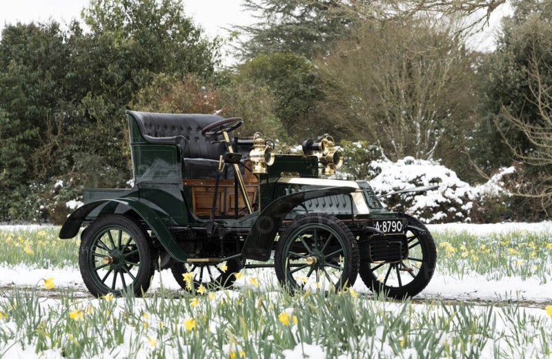 1904 De Dion Bouton model Q in snow with daffodils at Beaulieu. Creator: Unknown.