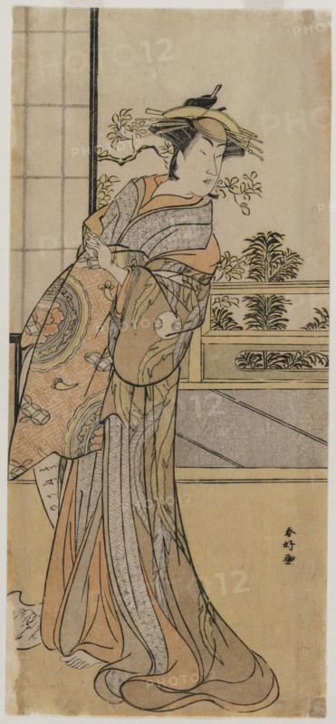 Arashi Murajiro as a Courtesan Holding a Letter, late 1780s. Creator: Katsukawa Shunko (Japanese, 1743-1812).