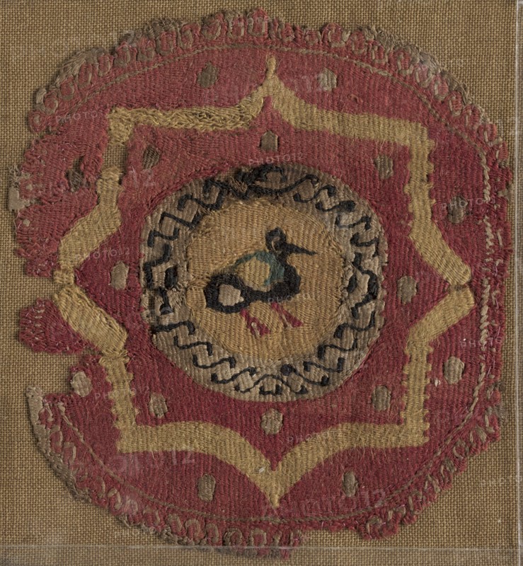 Circular Segmentum with Eight-Pointed Star and Bird, 600s - 700s. Creator: Unknown.