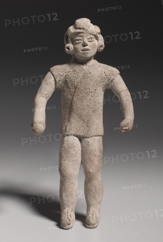 Figurine Holding A Ball(?), Xochipala style (1500-500 BC). Creator: Unknown.