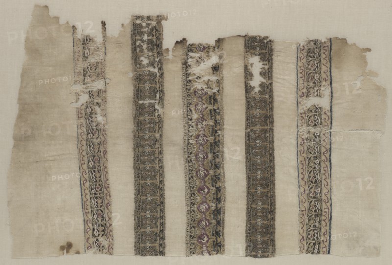 Fragment Composed of Parts of Three Tiraz-Style Textiles, 1094 - 1101. Creator: Unknown.