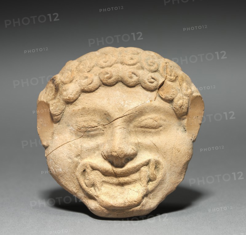 Gorgon Plaque with Incised Figure of a Dancing Satyr, c. 525-475 BC. Creator: Unknown.