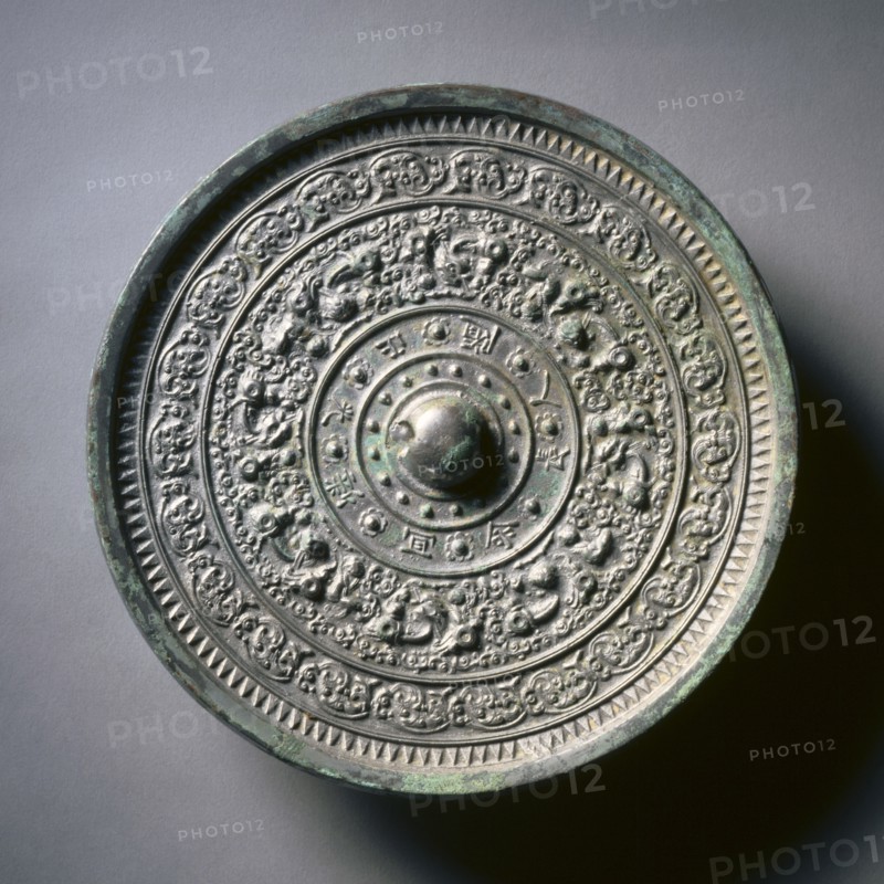Mirror with Deities and Animals in Concentric Circles, late 6th-early 7th century. Creator: Unknown.