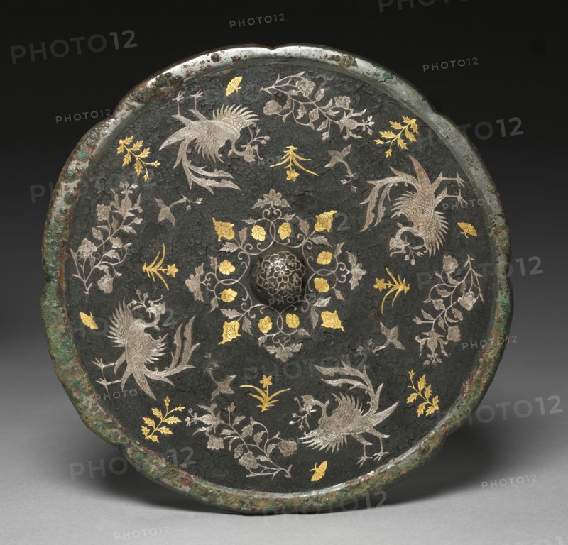 Mirror with Phoenixes, Birds, Butterflies, and Floral Sprays, 700s. Creator: Unknown.
