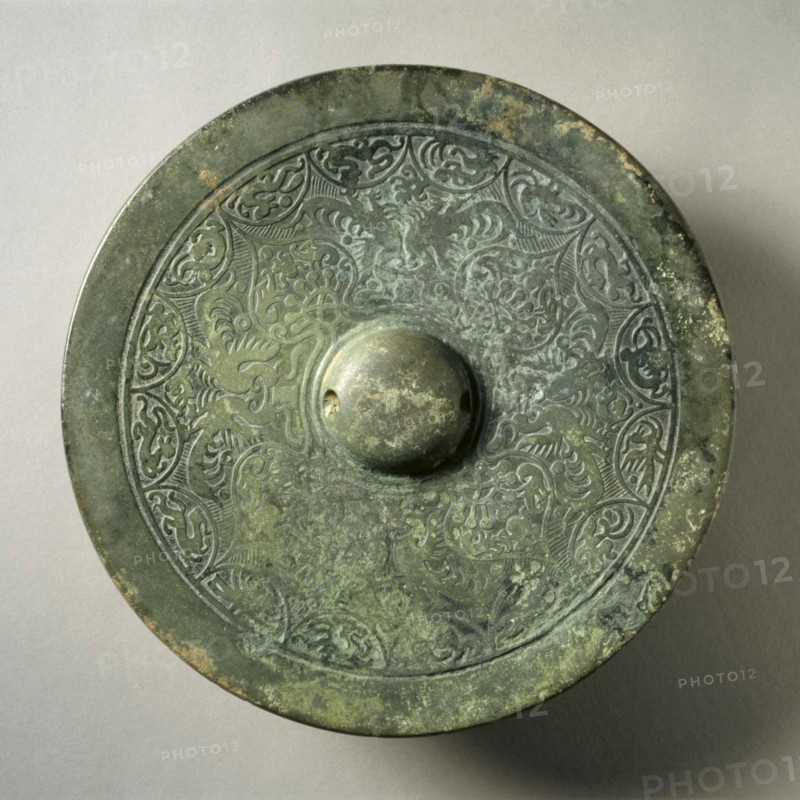 Mirror with Quatrefoil, Paired Phoenixes, and Auspicious Animals, early 3rd -early 4th century. Creator: Unknown.