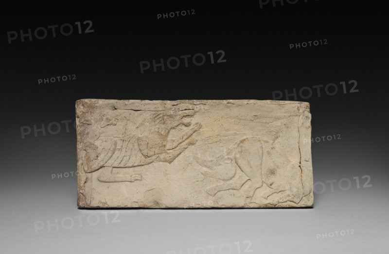 Relief with Rampant Tiger and Boar from a Funerary Stove Model, 206 BC- AD 220. Creator: Unknown.