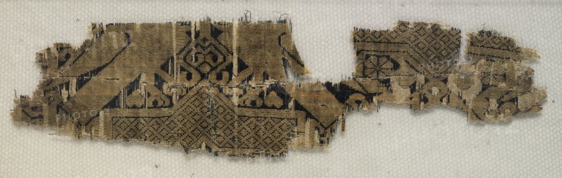 Textile Fragment with Portions of Eight-Pointed Star and Birds, 11th-12th century. Creator: Unknown.