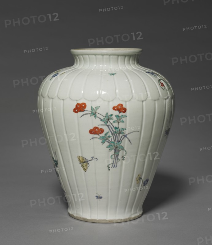 Vase with Floral, Insect, Bird, and Chinese Designs: Kakiemon Type, late 17th century. Creator: Unknown.