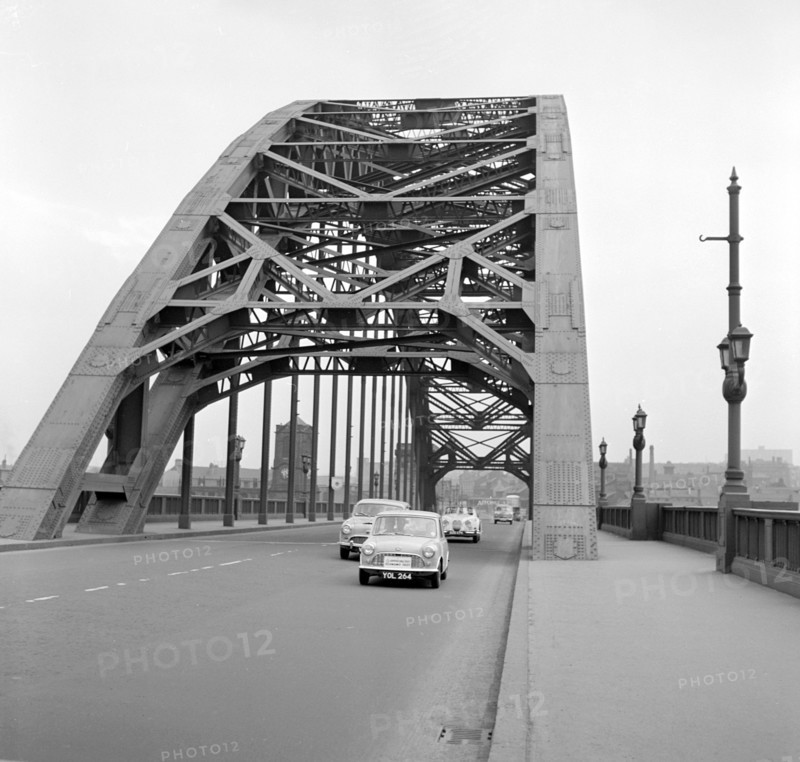 Mini on the 1959 Mobil Economy Run, Tyne Bridge in Newcastle. Creator: Unknown.