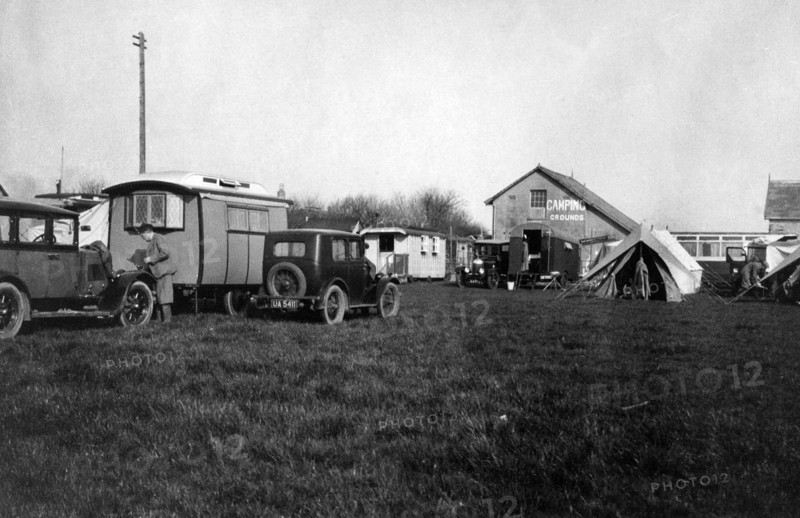 Voyageur caravan with Austin Seven on campsite  early 1930's. Creator: Unknown.