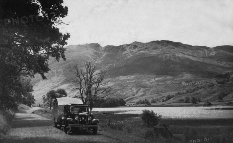 1930 Morris Oxford Six with Winchester Streamline caravan. Creator: Unknown.