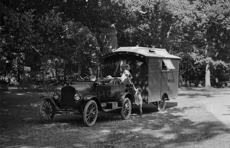 1921 Ford Model T with caravan. Creator: Unknown.