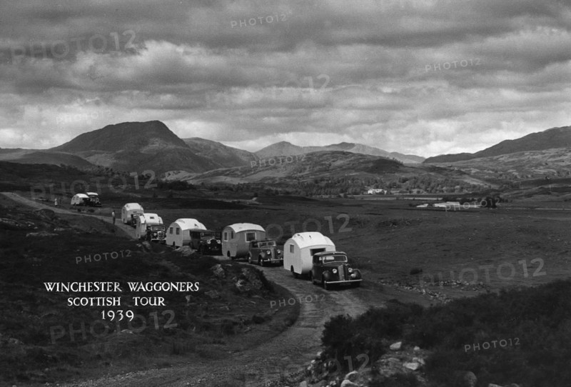 Group of cars and caravans camping in Scottish Highlands 1930's. Creator: Unknown.
