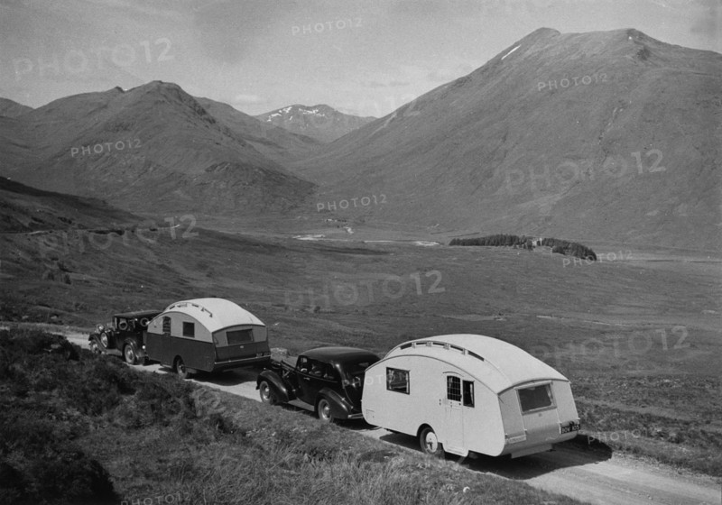1936 Austin Twenty with caravan and 1936 Oldsmobile Eight with caravan. Creator: Unknown.
