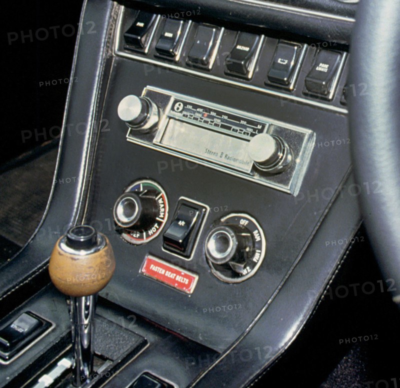1974 Jensen Interceptor dashboard showing 8 track cartridge sound system. Creator: Unknown.