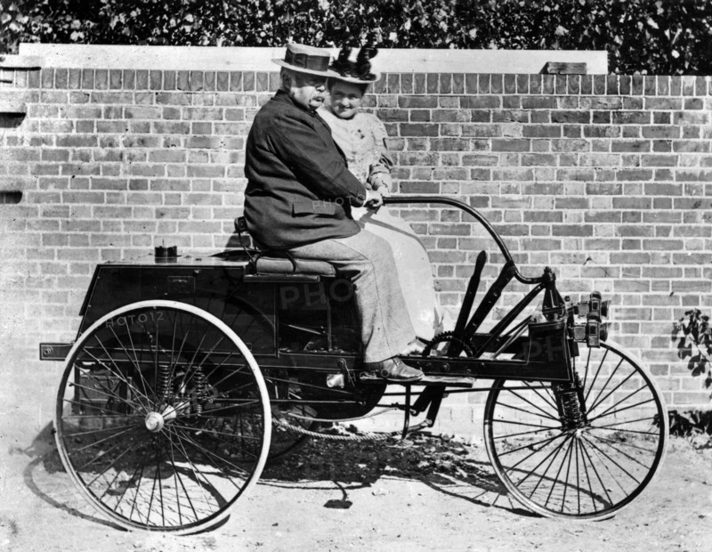 John Henry Knight and wife on Knight 1895 3 wheeler. Creator: Unknown.
