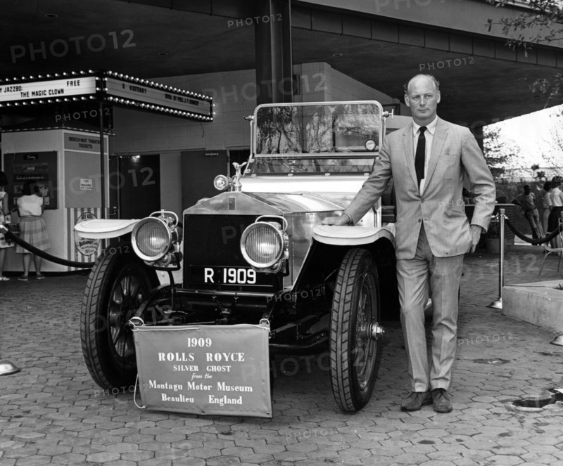 Lord Montagu with 1909 Rolls - Royce Silver Ghost at 1964 World's Fair, New York. Creator: Unknown.