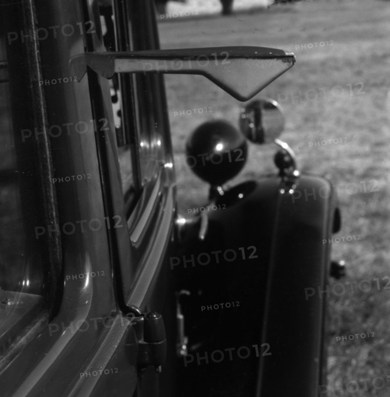 Semaphore indicator arm on 1937 Morris 8 series II. Creator: Unknown.