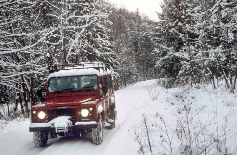 2001 Land Rover Defender driving in snowy conditions. Creator: Unknown.
