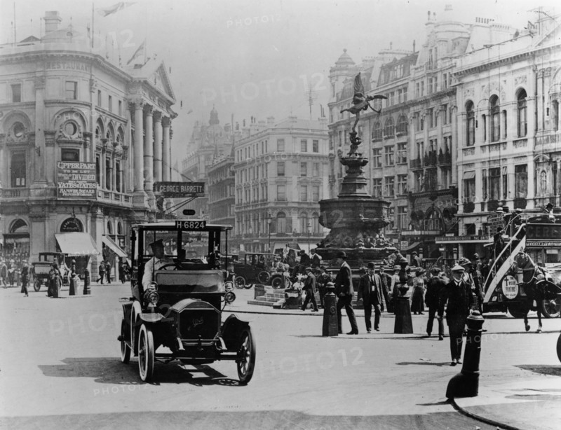 Unic taxi in Piccadilly circus, London circa 1910. Creator: Unknown.