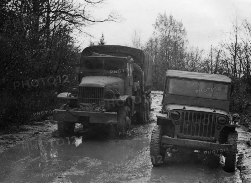 GMC 352 CCKW and Willys Jeep circa 1944. Creator: Unknown.