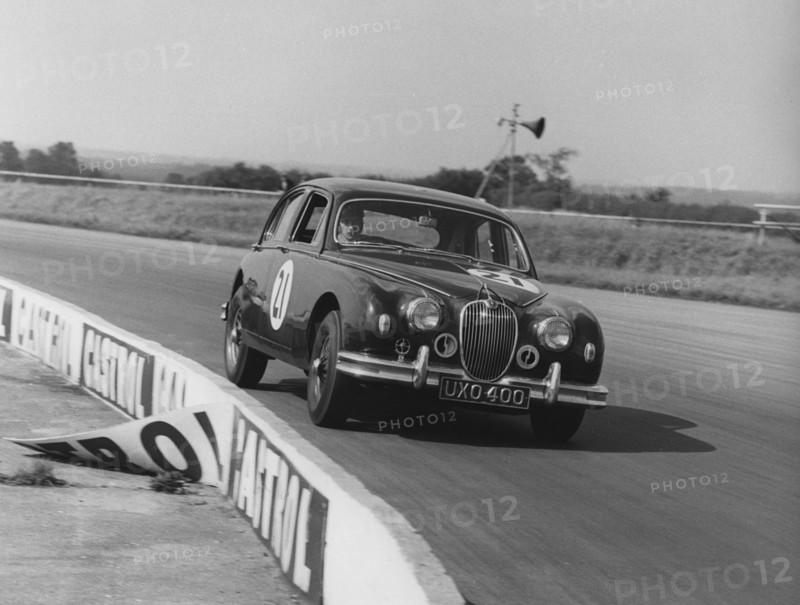 Jaguar 3.4 Mark1 J.W. Dean at Silverstone 1961. Creator: Unknown.
