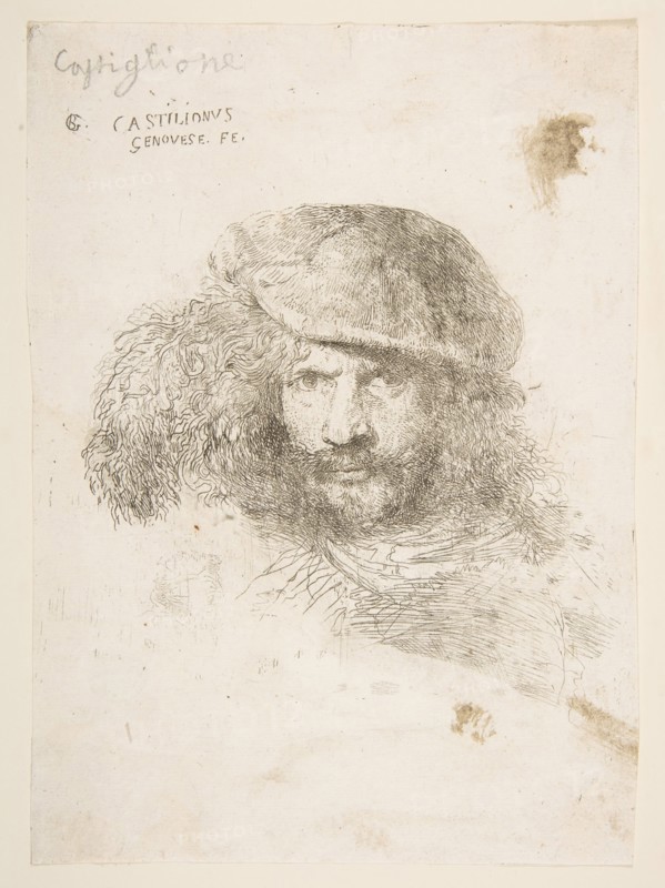 Head of a man wearing a feathered cap