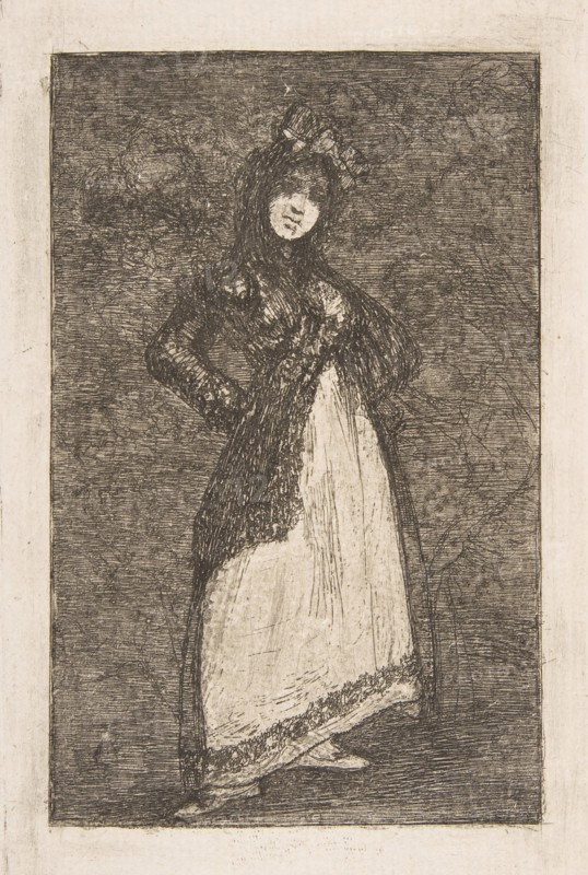A 'Maja' standing against a dark background
