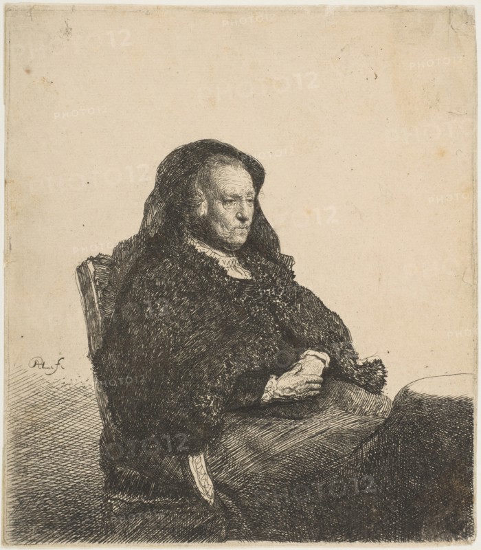 The Artist's Mother Seated at a Table Looking Right: Three-Quarter Length, ca. 1631. Creator: Rembrandt Harmensz van Rijn.