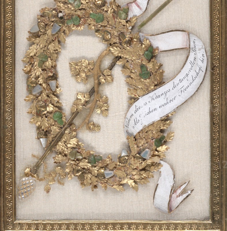 Greeting Card: wreath with acorns and oak leaves, a rod with grape vines and pearl finials; gouache, metallic paint, metallic foil, embossed and punched paper, and carved and painted mother of pearl on silk chiffon, with a gold paper border, 1810.