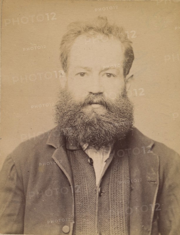 Bouchenez. Adolphe. 36 ans, 27/2/94. (En rouge barrant la fiche: "Transféré à Mazas. À faire extraire"). , 1894.